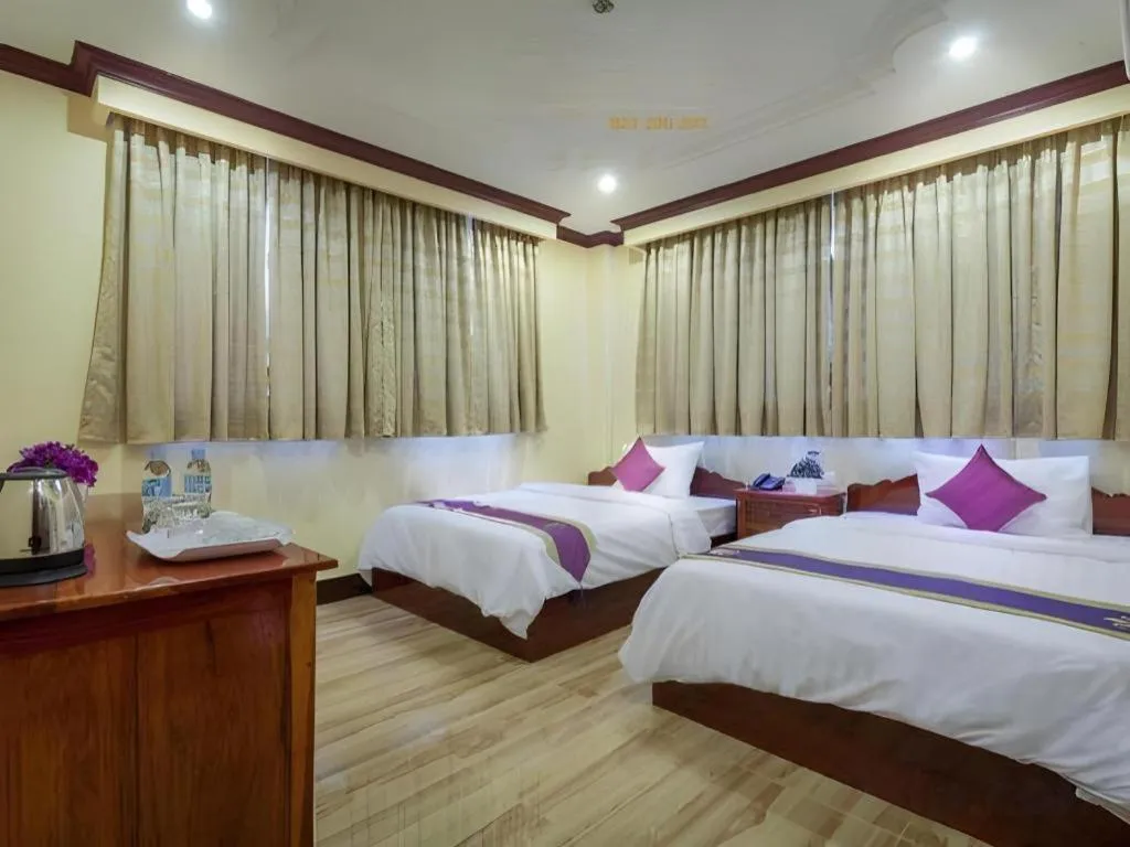 Bed in The Mou Hotel