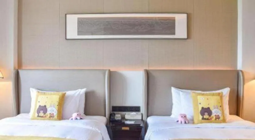 Bed in Wyndham Grand Plaza Royale Huayu Chongqing