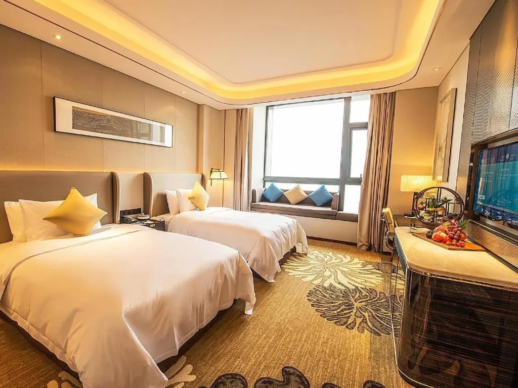 Bed in Wyndham Grand Plaza Royale Huayu Chongqing