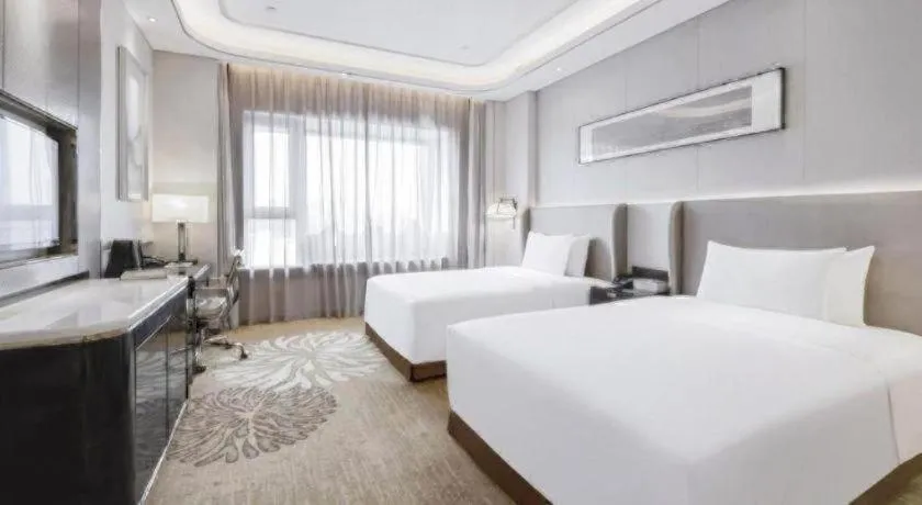Bed in Wyndham Grand Plaza Royale Huayu Chongqing