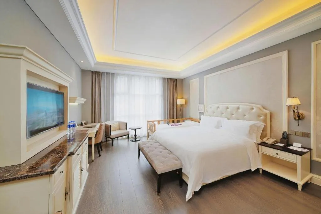 Bed in Yin Run Jin Jiang Castle Hotel