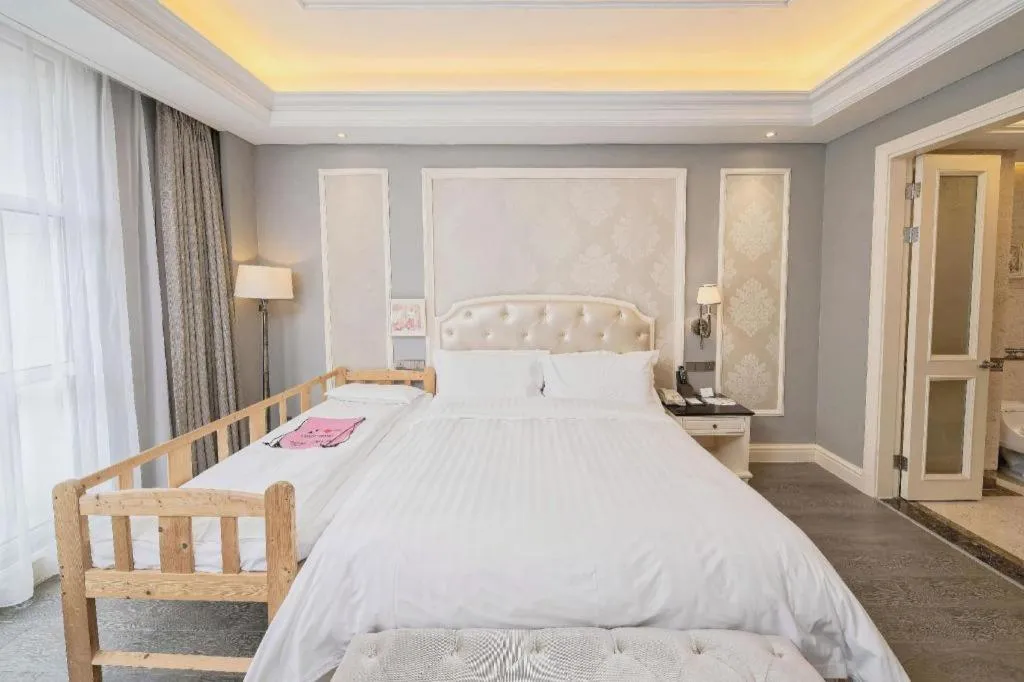 Bed in Yin Run Jin Jiang Castle Hotel