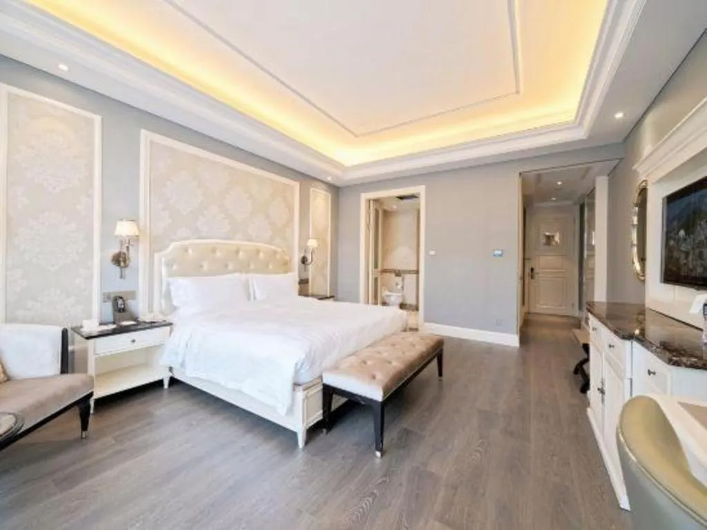 Bed in Yin Run Jin Jiang Castle Hotel