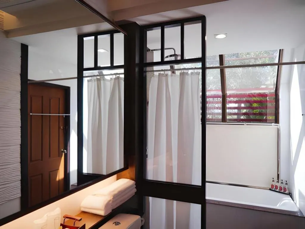 Bed in Doltara Boutique Resort
