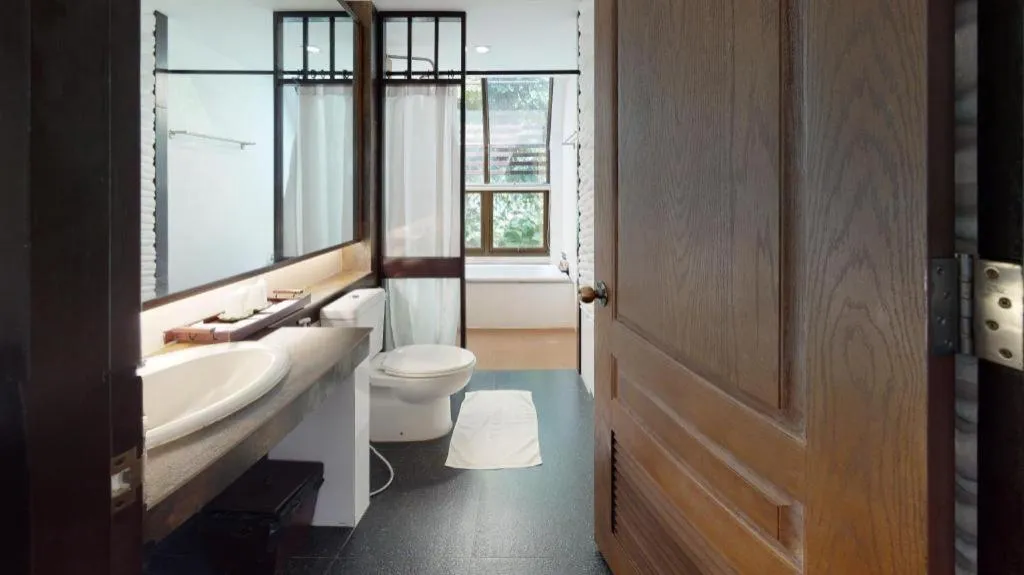 Bed in Doltara Boutique Resort