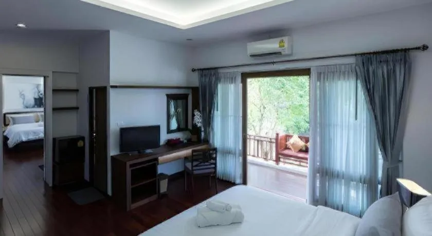 Bed in Doltara Boutique Resort