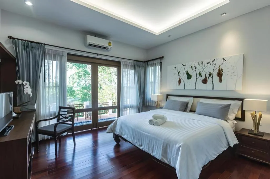 Bed in Doltara Boutique Resort