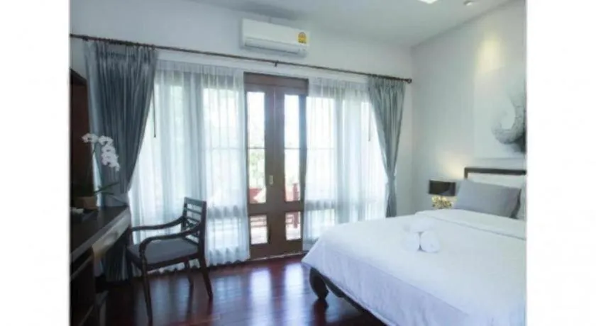 Bed in Doltara Boutique Resort