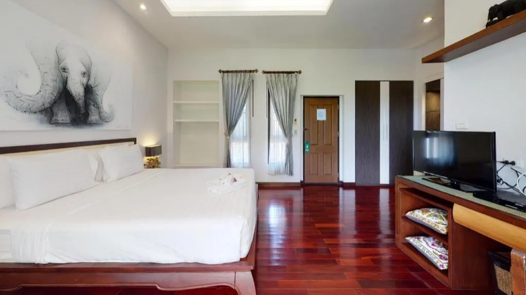 Bed in Doltara Boutique Resort