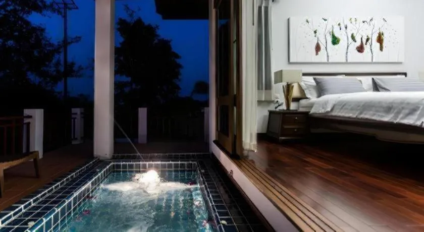 Bed in Doltara Boutique Resort