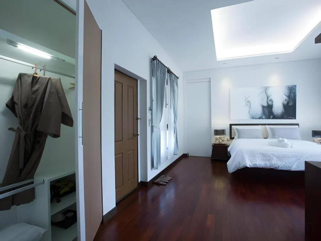 Bed in Doltara Boutique Resort