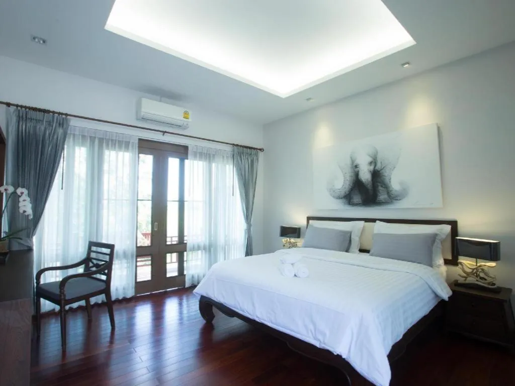 Bed in Doltara Boutique Resort