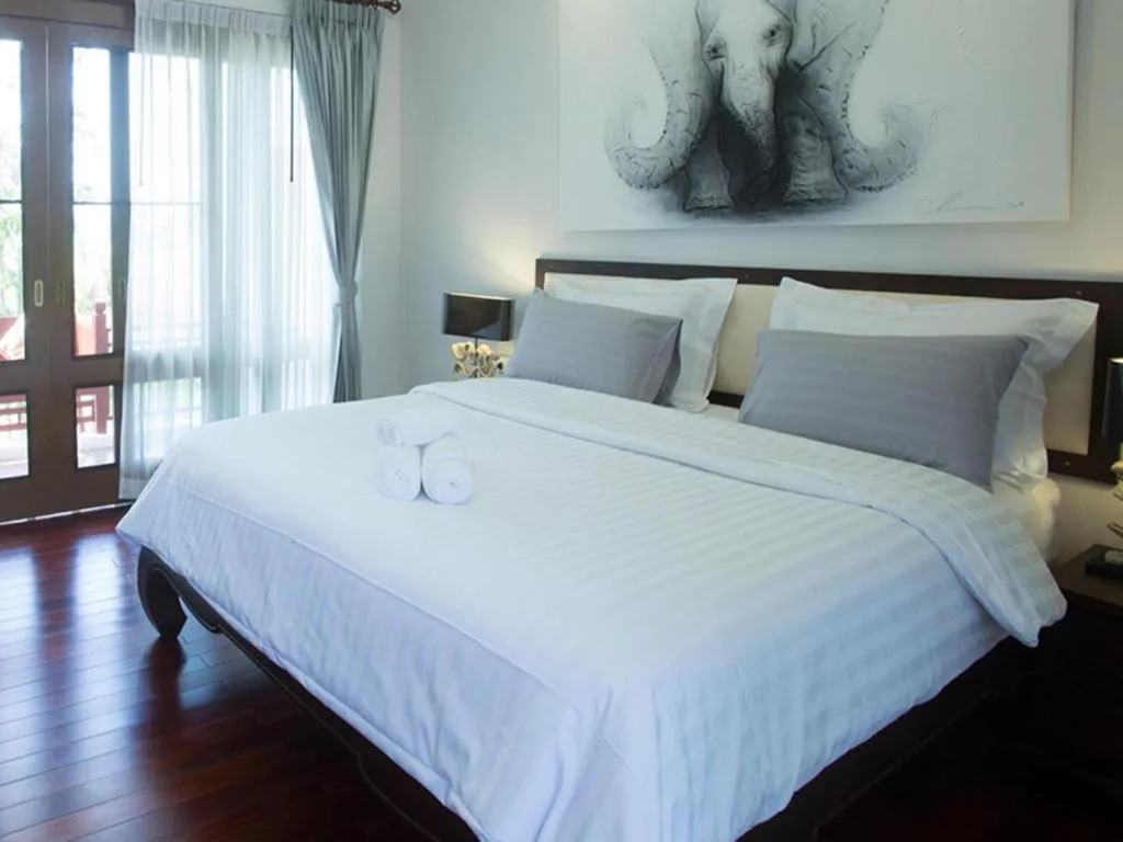 Bed in Doltara Boutique Resort