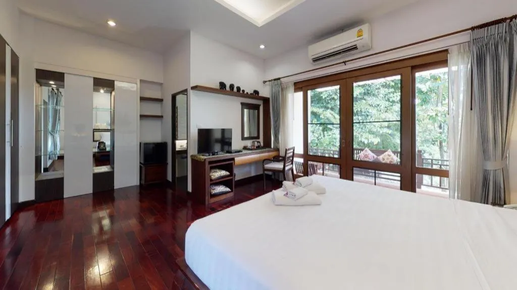 Bed in Doltara Boutique Resort