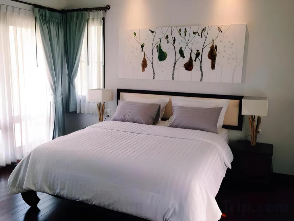 Bed in Doltara Boutique Resort
