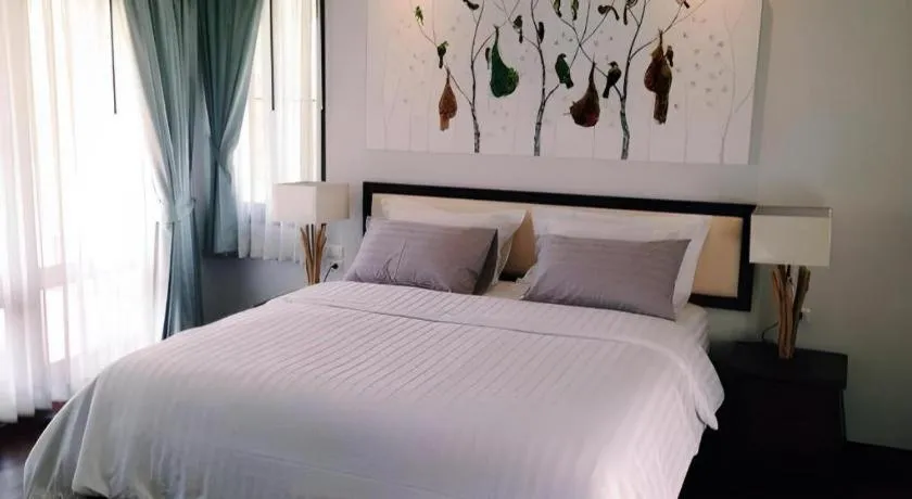 Bed in Doltara Boutique Resort