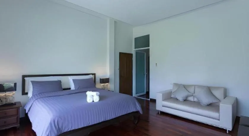 Bed in Doltara Boutique Resort