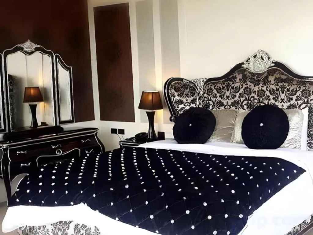 Bed in Alvarez Hotel