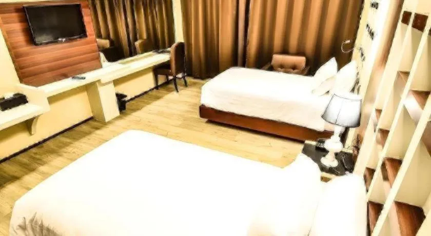 Bed in Alvarez Hotel
