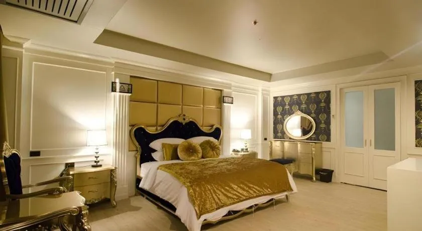 Bed in Alvarez Hotel