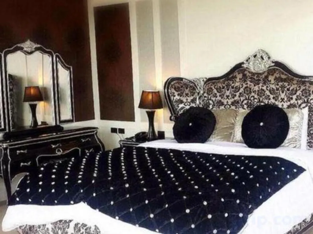 Bed in Alvarez Hotel