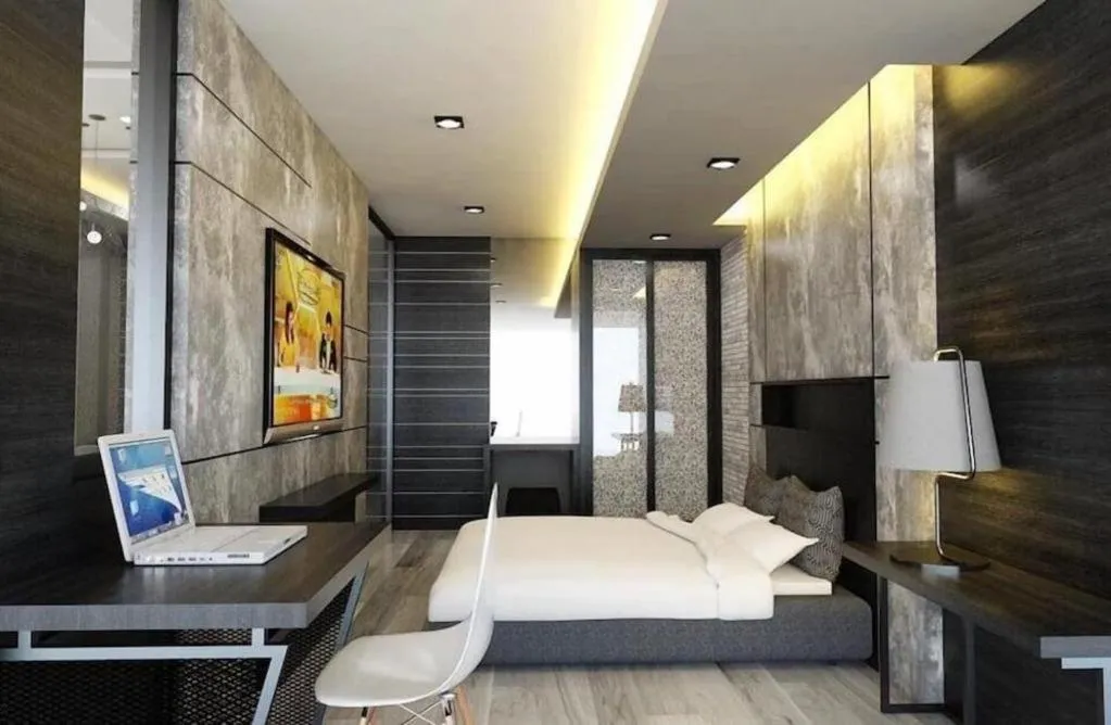 Bed in Alvarez Hotel