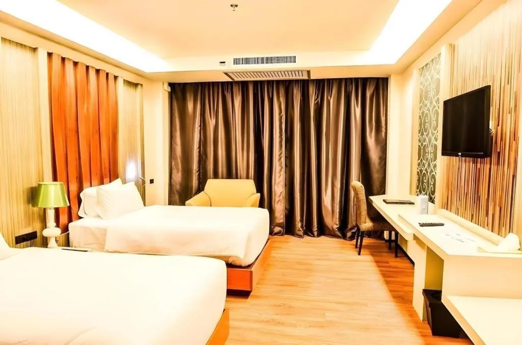 Bed in Alvarez Hotel