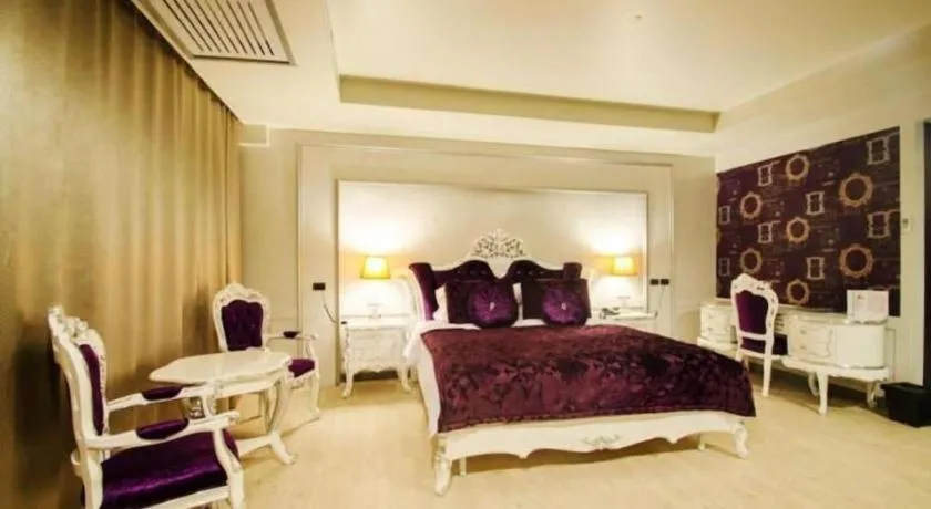 Bed in Alvarez Hotel