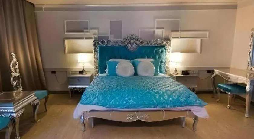 Bed in Alvarez Hotel