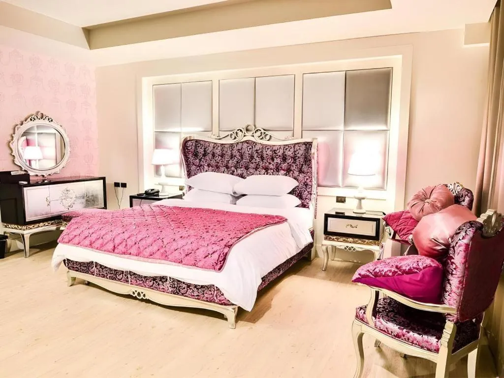 Bed in Alvarez Hotel