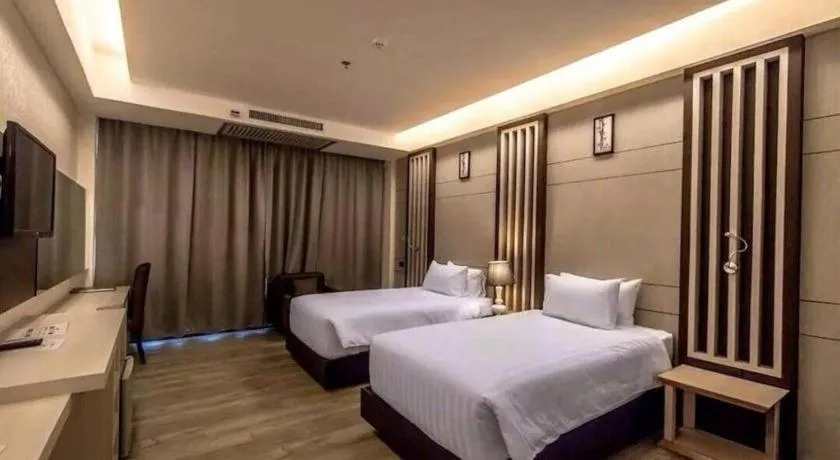 Bed in Alvarez Hotel