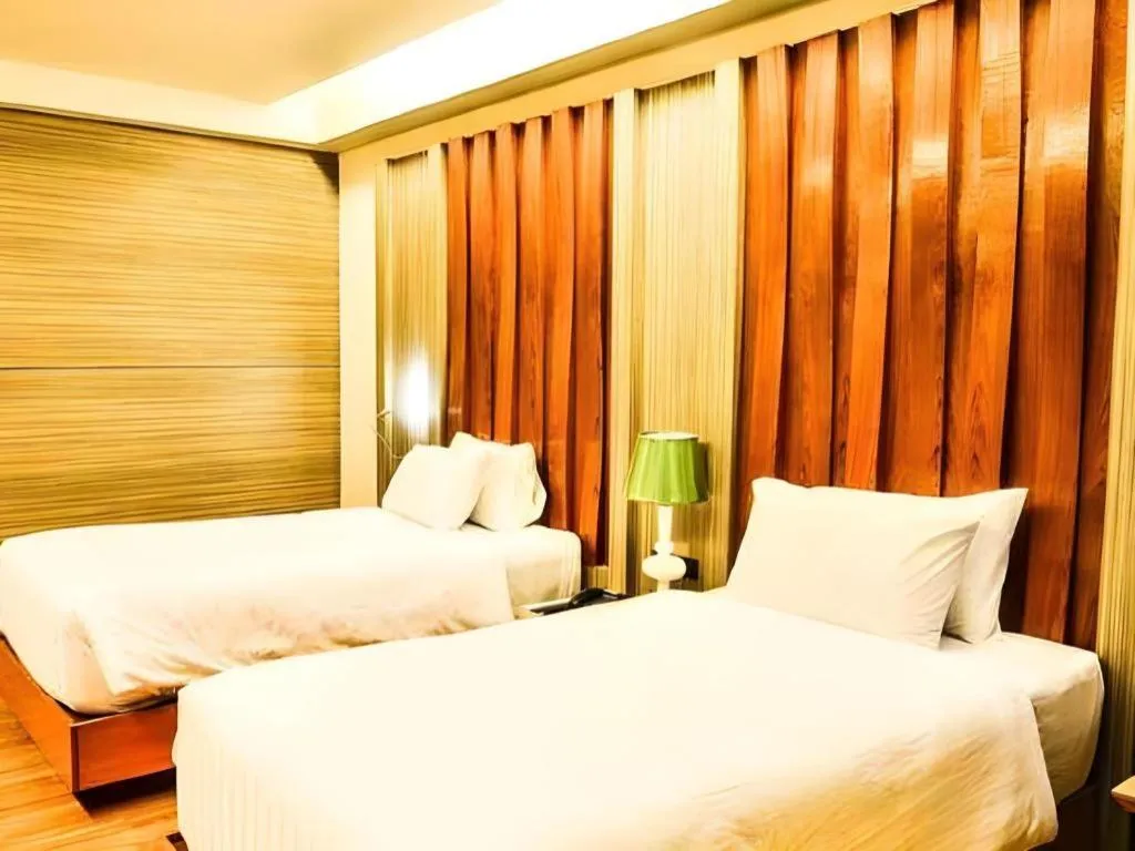 Bed in Alvarez Hotel