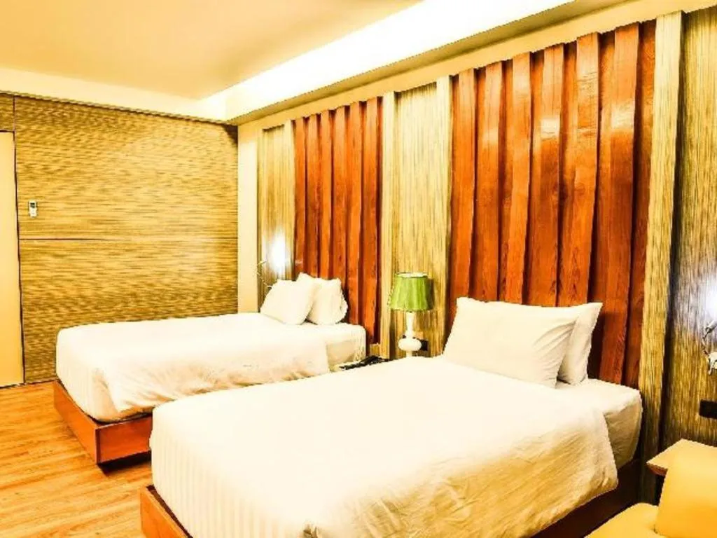 Bed in Alvarez Hotel