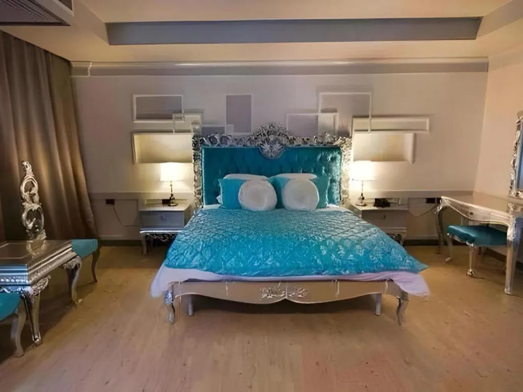 Bed in Alvarez Hotel