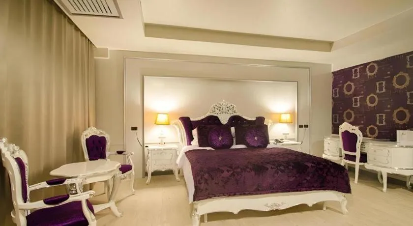 Bed in Alvarez Hotel