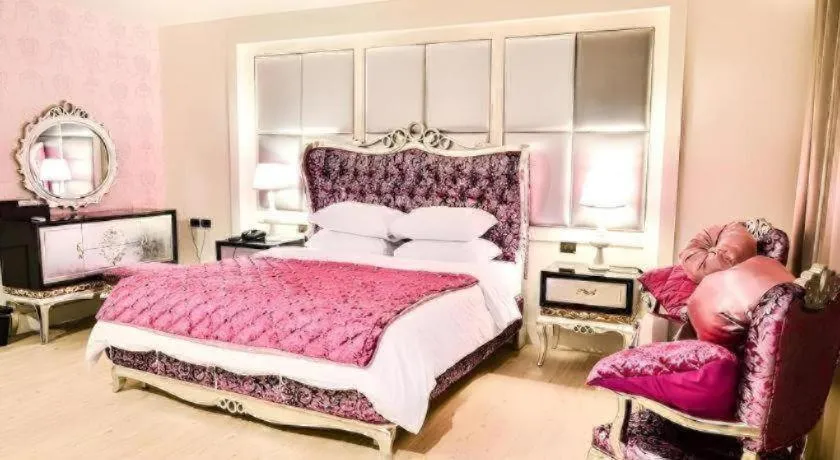 Bed in Alvarez Hotel