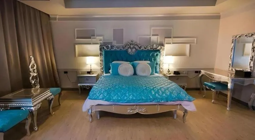 Bed in Alvarez Hotel