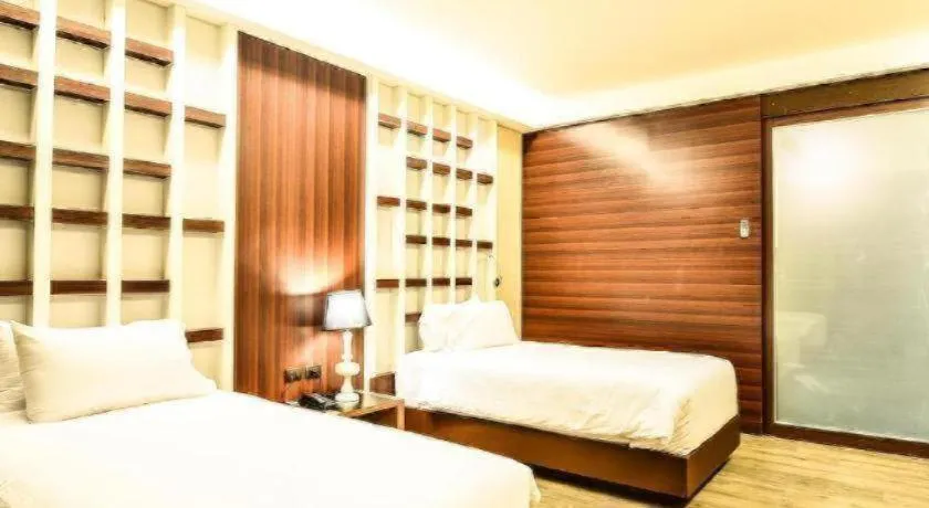 Bed in Alvarez Hotel