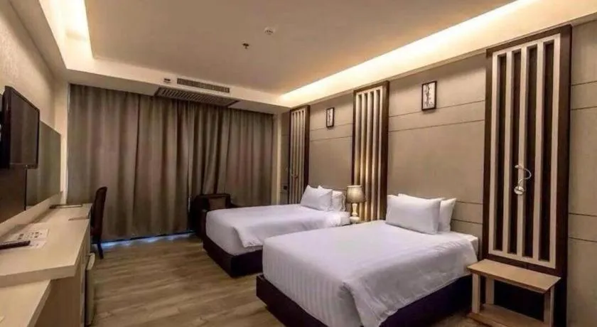 Bed in Alvarez Hotel