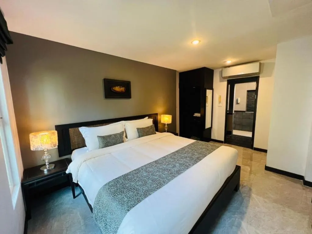 Bed in iL Mare Resort