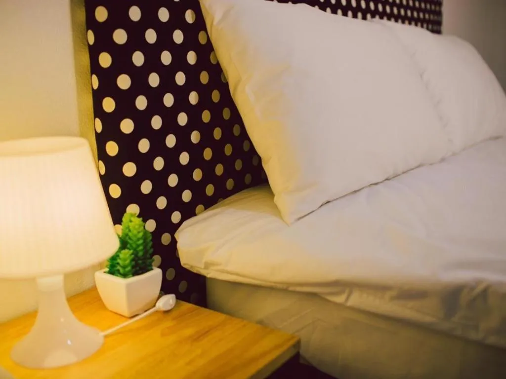 Bed in Maalamaii Hotel