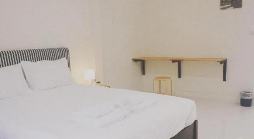 Bed in Maalamaii Hotel