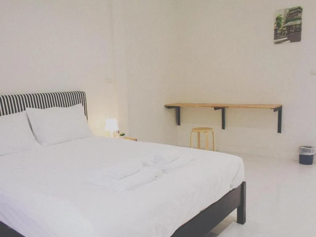 Bed in Maalamaii Hotel