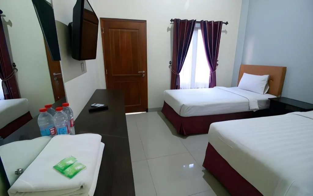 Bed in Malioboro Garden Hotel Yogyakarta