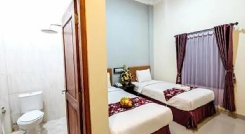 Bed in Malioboro Garden Hotel Yogyakarta