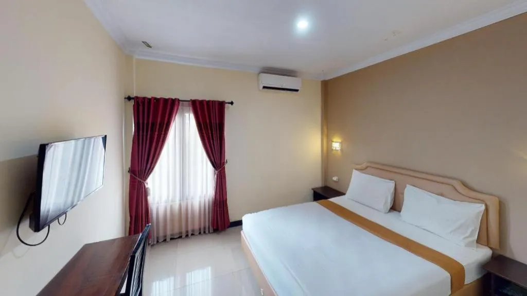 Bed in Malioboro Garden Hotel Yogyakarta