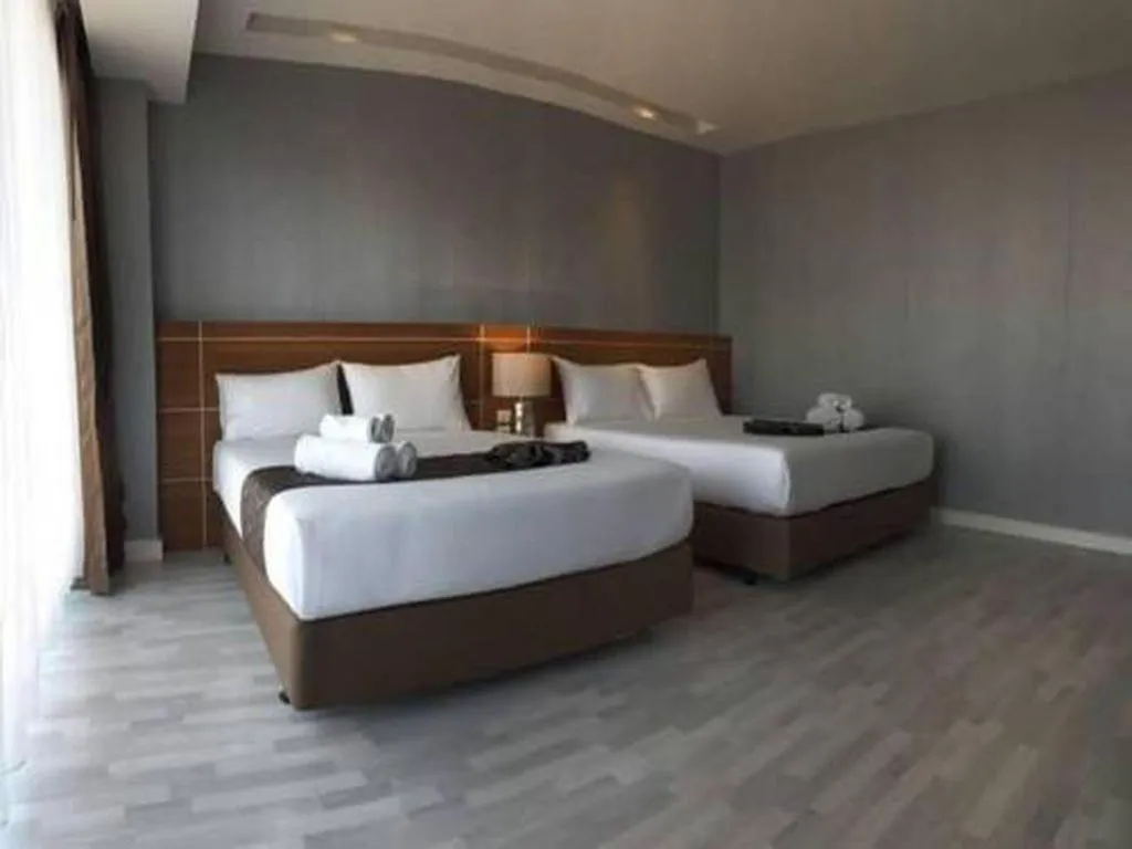 Bed in Tanzeno Hotel