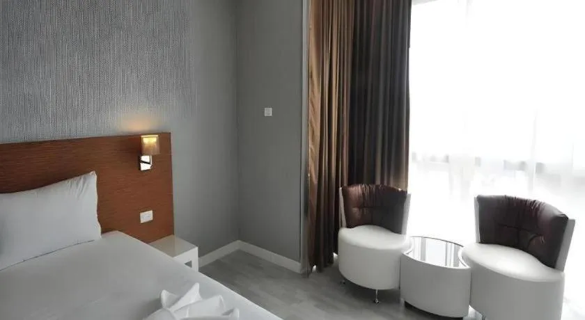 Bed in Tanzeno Hotel