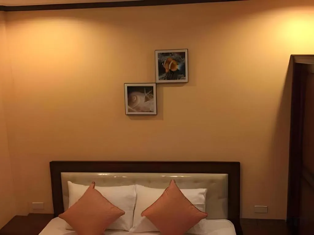 Bed in Sea Breeze Resort