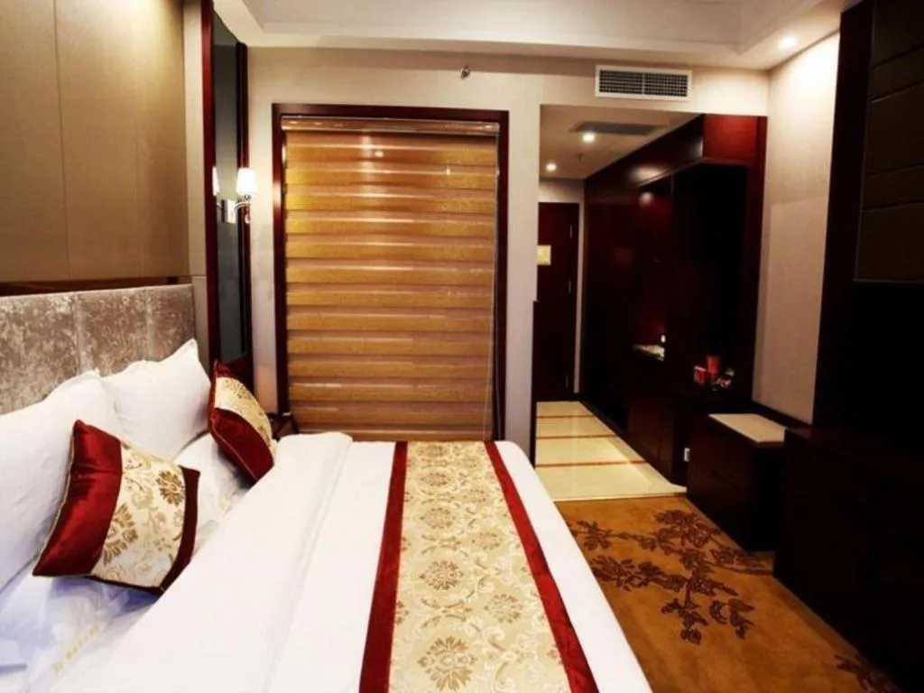 Bed in GreenTree Eastern Zigong Huashang International City Huichuan Road Hotel